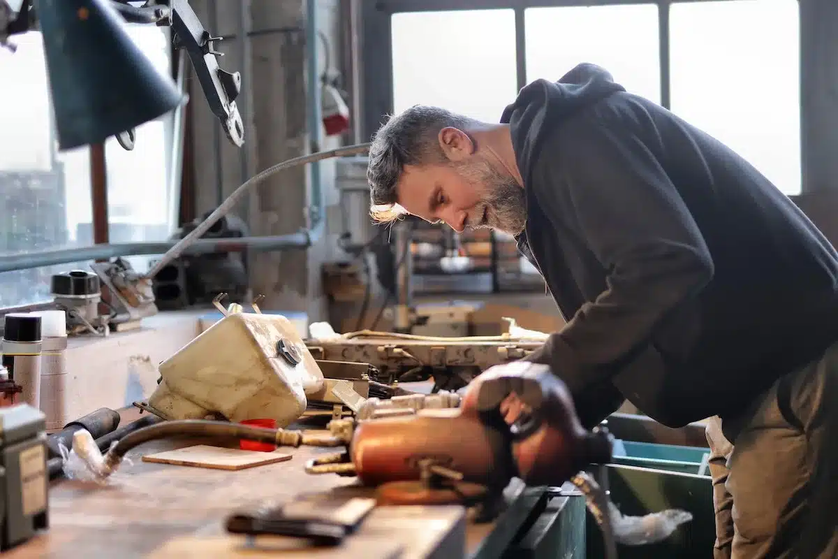 man etching on metal