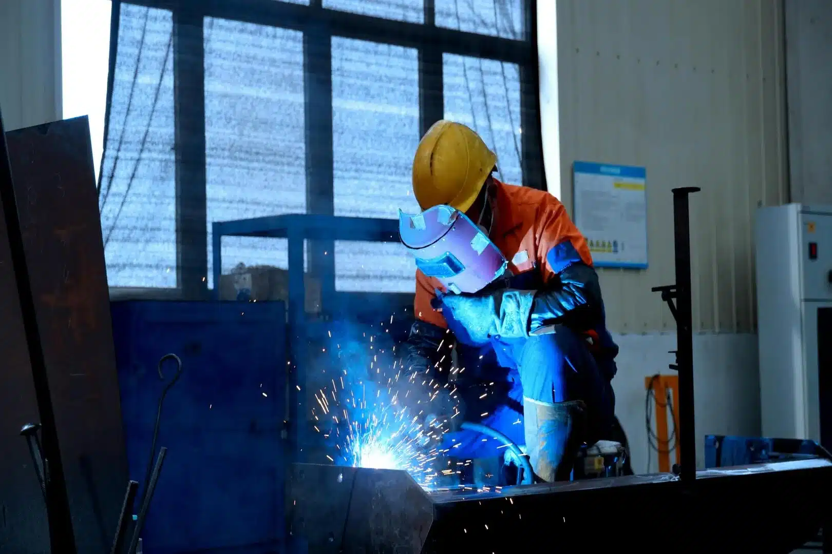 A man welding a metal